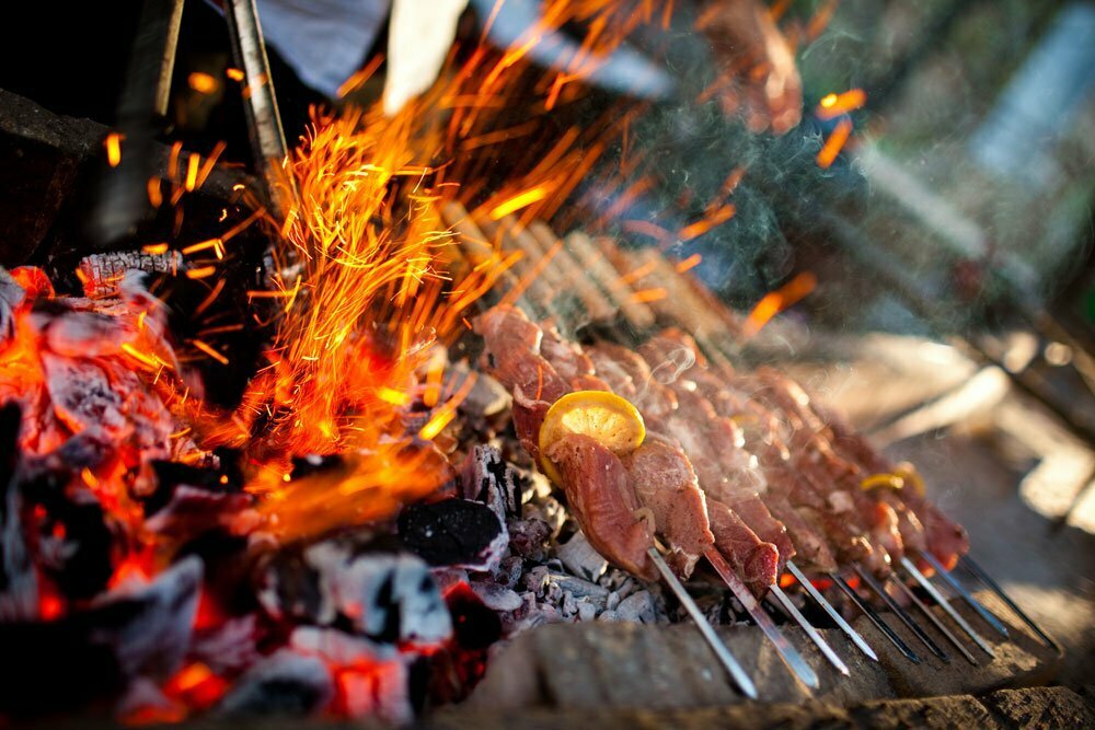 Skewer cooking on a charcoal grill
